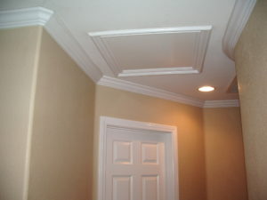 Photo of crown molding in a hallway to illustrate different home improvement projects.