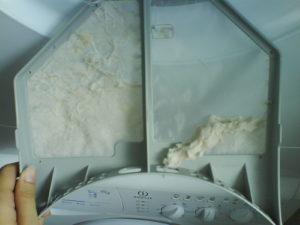 Photo of a full dryer lint screen to illustrate points about fire hazards in the home.