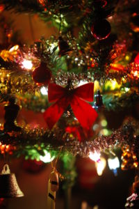 Close up photo of a Christmas tree to illustrate a Christmas movie guide.