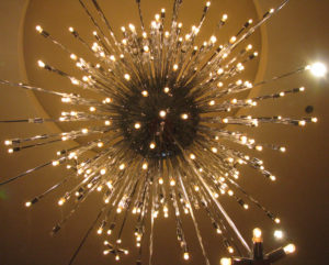 Beautiful sputnik light fixture for an example of how to add warmth to a room.