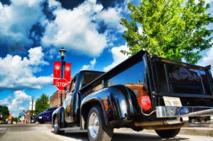 Photo of a classic car in downtown Plainfield for an article about Plainfield summer events.