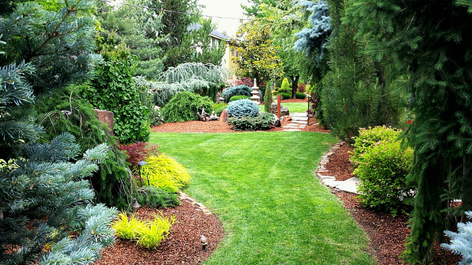 Photo of a beautifully landscaped yard for an article about unique yard projects.