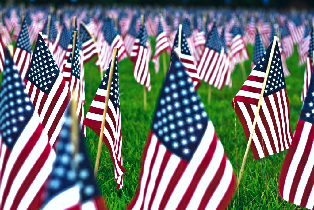 Photo of American flags for an article listing 4th of July weekend activities.