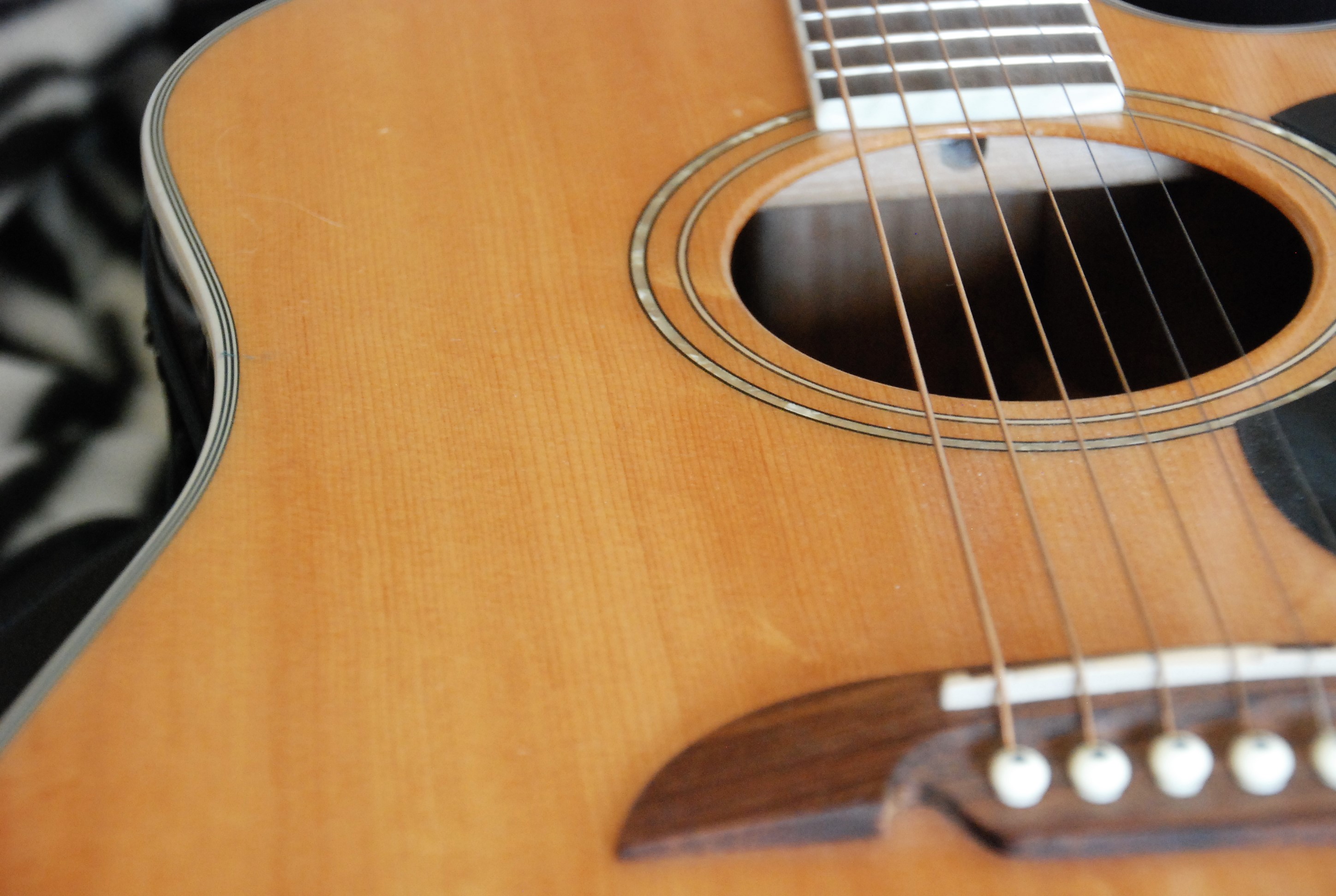 Photo of a guitar for an article about upcoming Shorewood events including an outdoor concert.