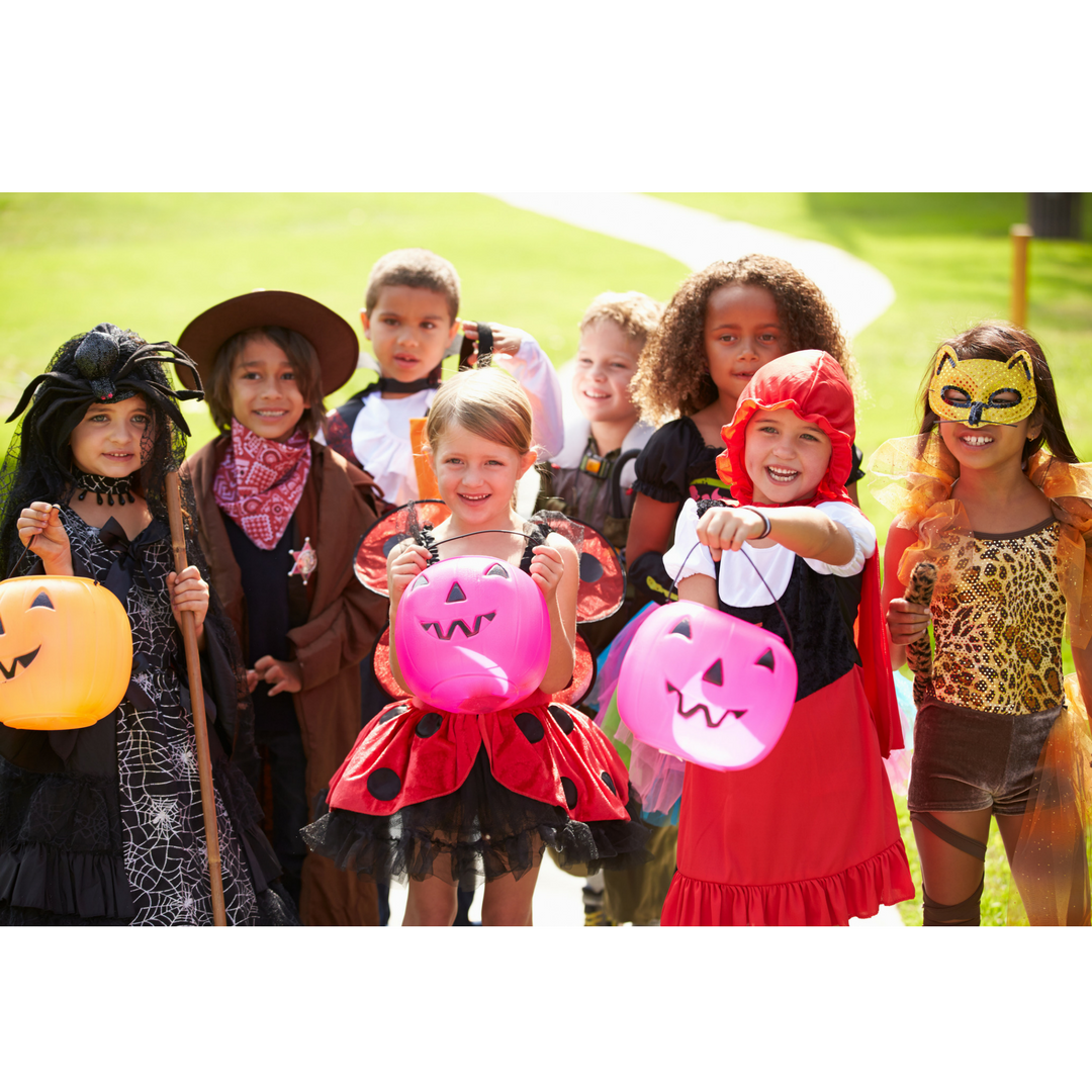 Photo of kids on Halloween for an article on trick or treating hours.