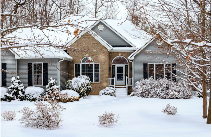 Photo of a home in the winter for an article about winter real estate.