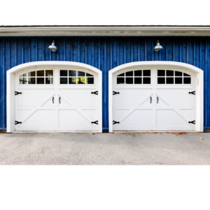 Two white garage doors that boost spring curb appeal.
