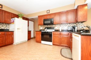 Spacious kitchen in a home for sale in Farmingdale Village.