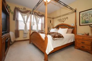 Luxury master bedroom of 700 S Mecosta Lane Romeoville.