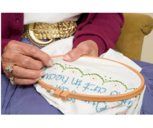 A photo of someone sewing; one of the upcoming Plainfield events is a Social Stitch club meeting.