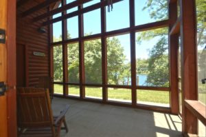 Screened in porch of 7765 Pine Bluff Road Morris.