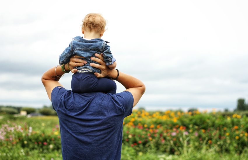 Baby on a father's shoulders; there are so many local places to celebrate upcoming Father's Day.