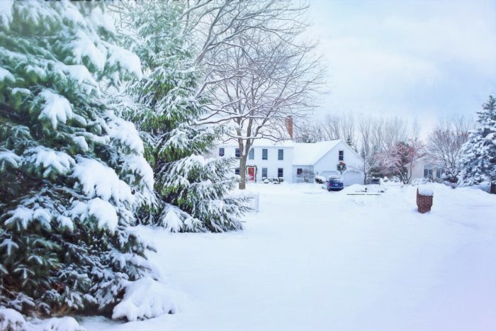 House with lot's of snow on the ground; winter homebuying can be a good idea.