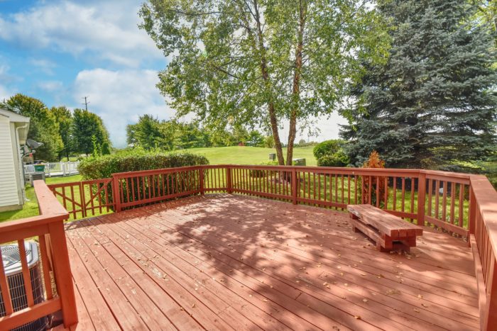 Large beautiful deck backs up to golf course in Lakewood Falls.