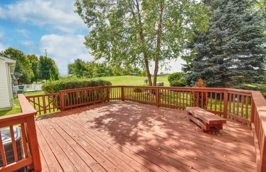 Large beautiful deck backs up to golf course in Lakewood Falls.